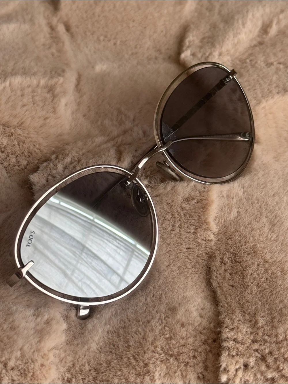Tod’s sunglasses with leather case